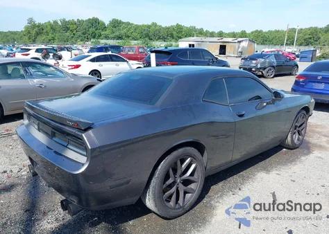 2013 Dodge Challenger Sxt z USA, uszkodzony, nr VIN 2C3CDYAG2DH582300